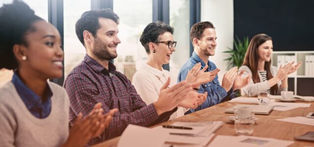 clapping staff in office