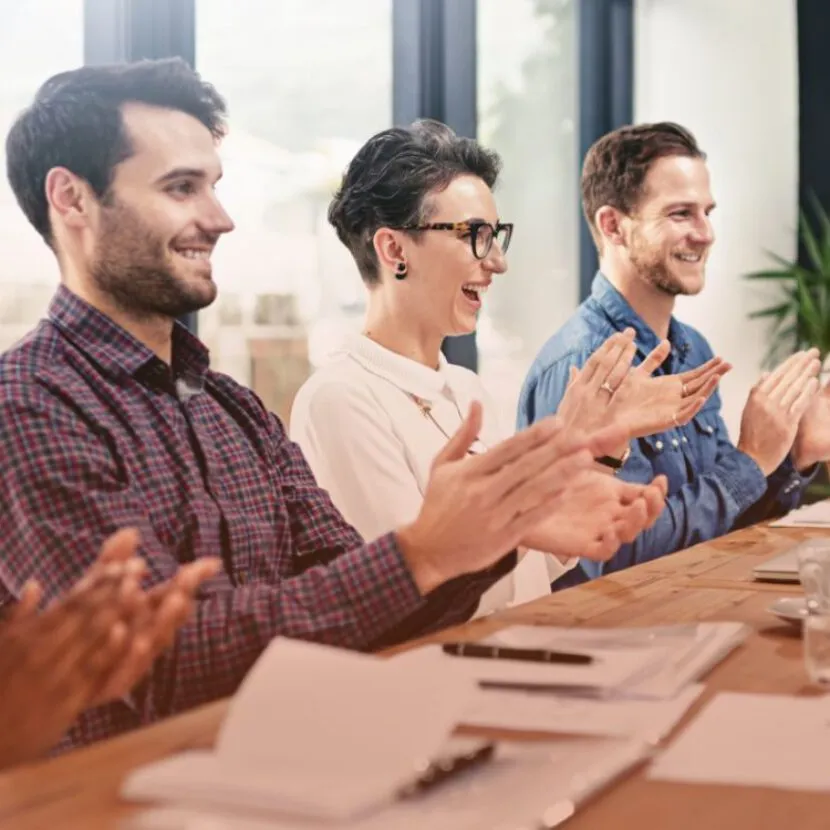 clapping staff in office