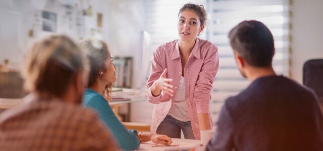 woman delegating to team