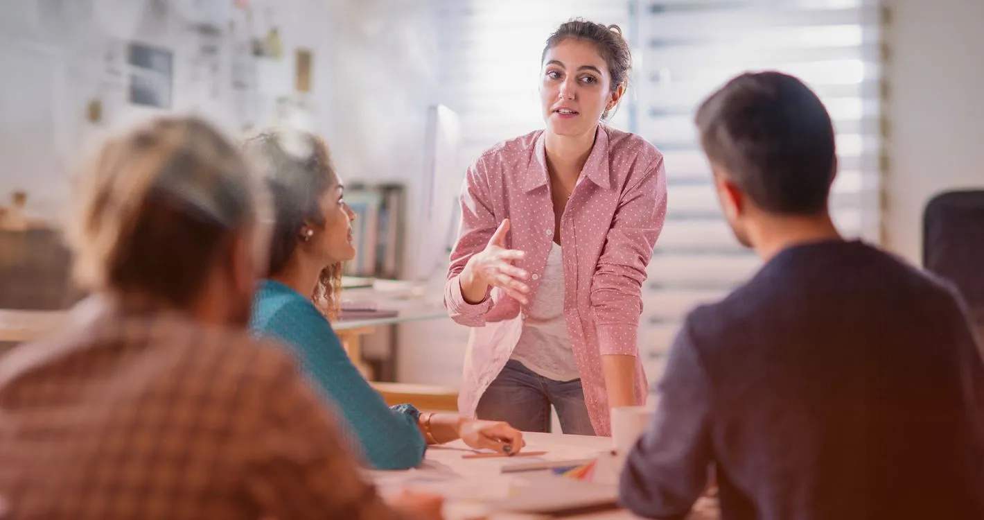 woman delegating to team