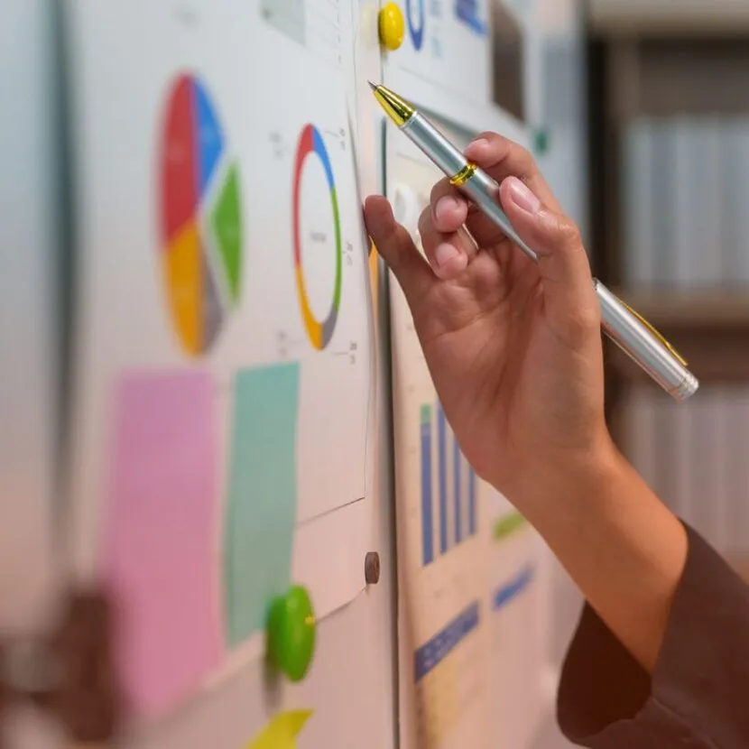 jotting notes on charts in office