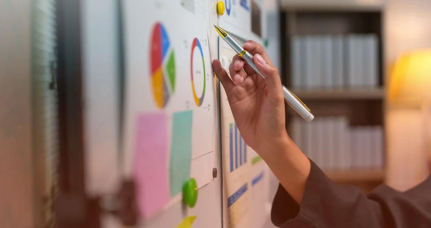 jotting notes on charts in office