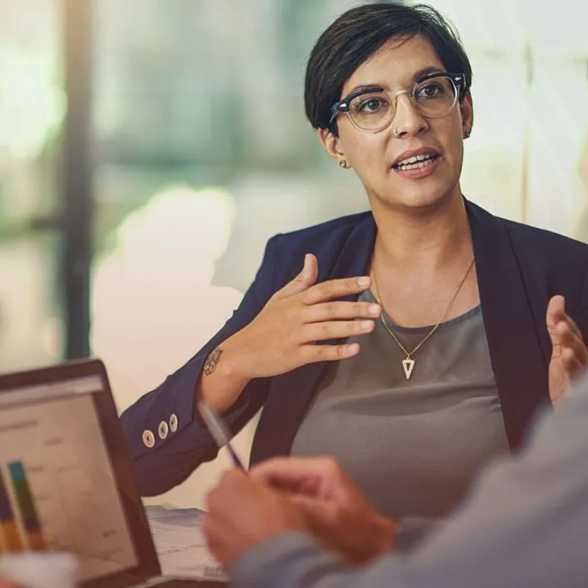 female speaker explaining point
