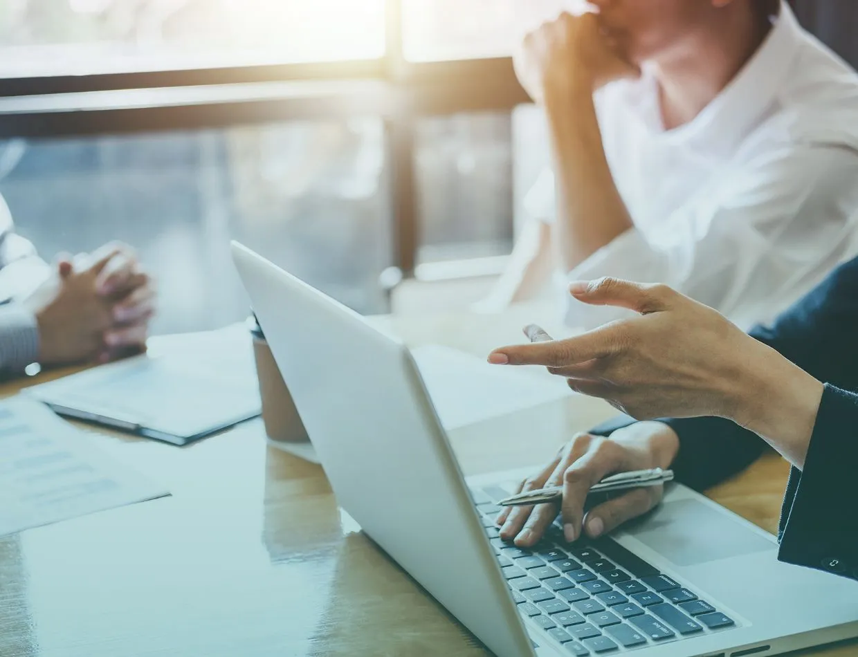 open laptop in meeting