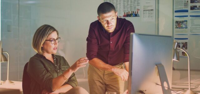 deep in thought individuals around computer