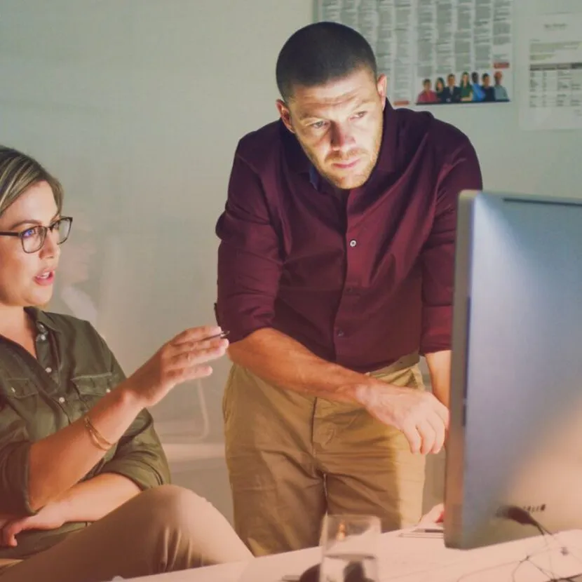 deep in thought individuals around computer