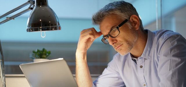 ponderous man with laptop