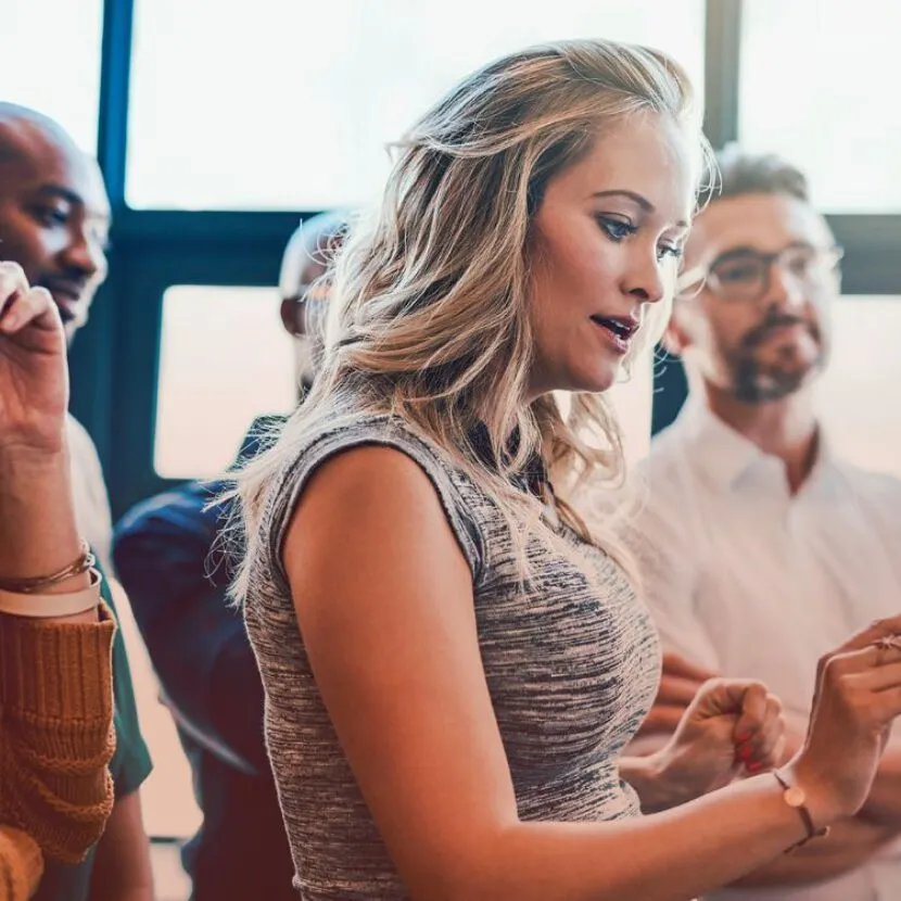 woman writing on whiteboard