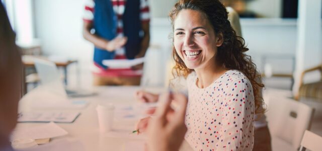 smiling fun woman in office