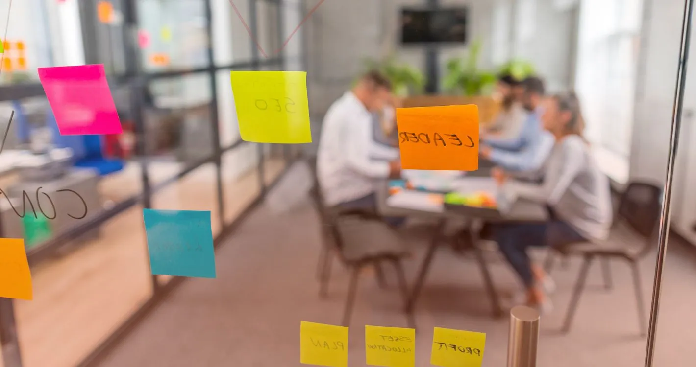 post it notes against office window