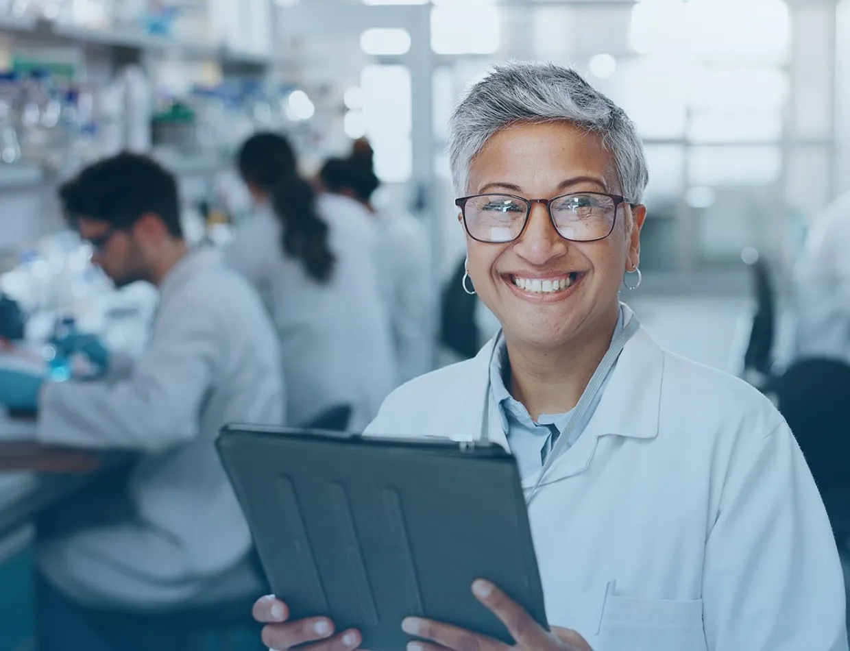 smiling woman in lab