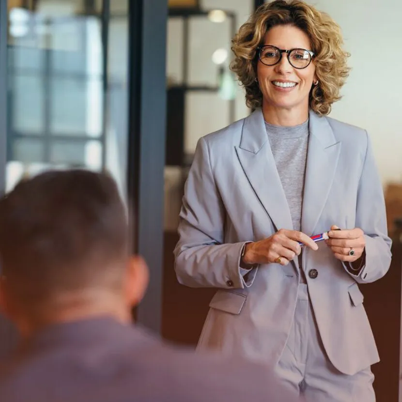 confident woman speaking to group