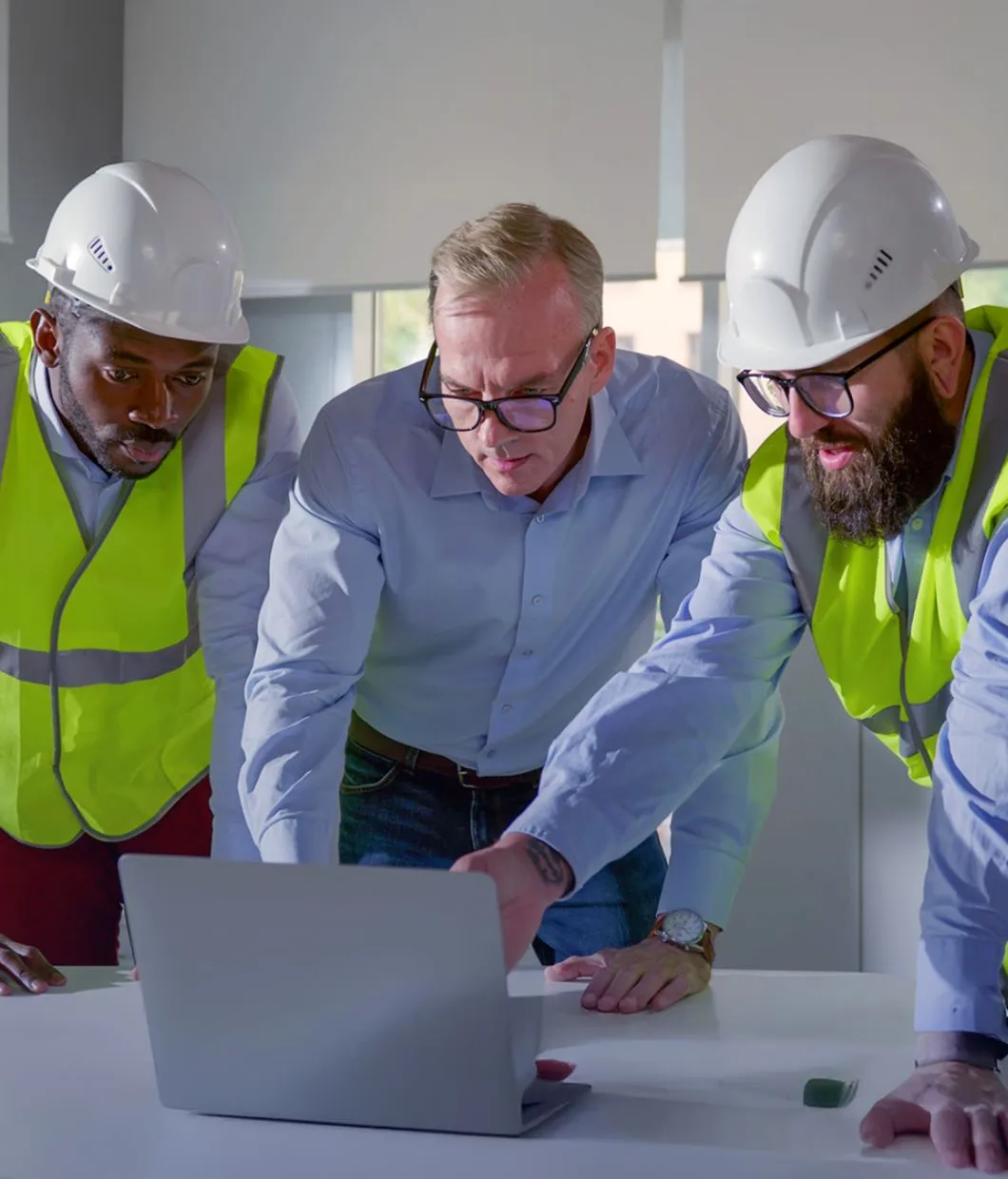 manufacturing operatives on laptop