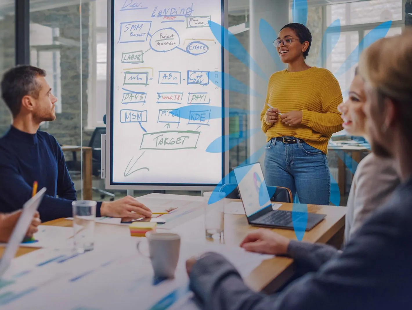 project managers huddled in boardroom