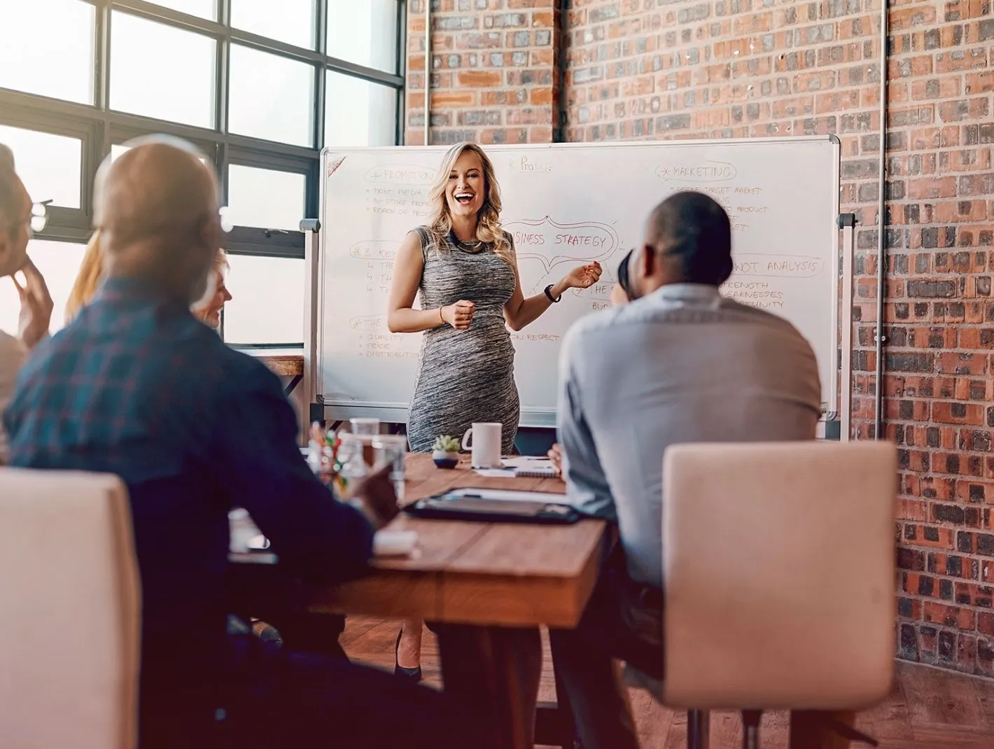 woman entrepreneur presenting to group