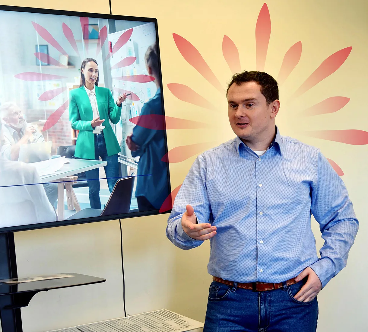 presenting to team with visual display in background